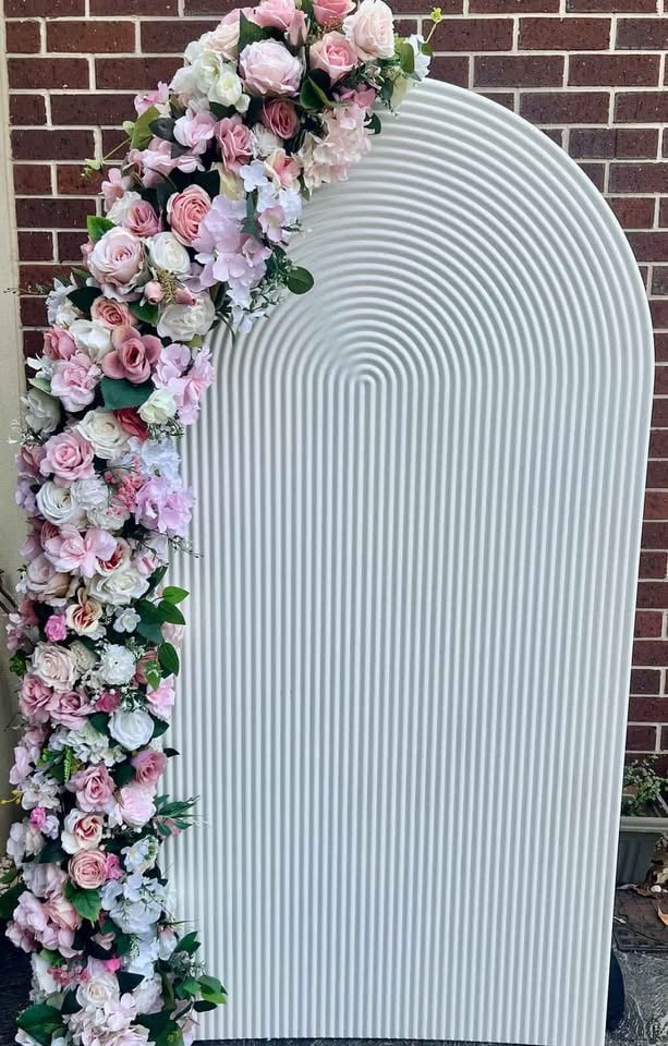 Hire - ripple arch with 2M flowers panel $125 Ripple plinth $25 photo 3