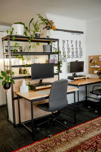 A dedicated desk in a creative video agency office photo 2