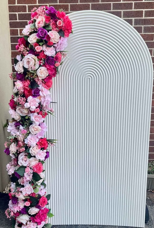 Hire - ripple arch with 2M flowers panel $125 Ripple plinth $25 photo 2