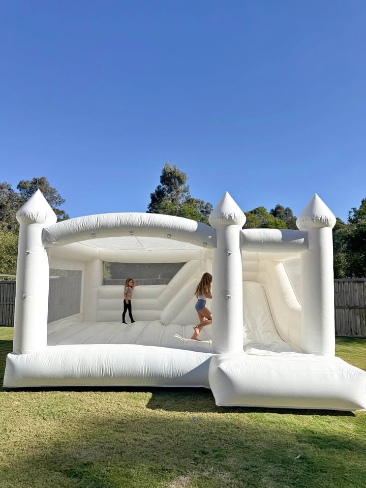 Luxe White Jumping castle for hire 5x5 photo 6