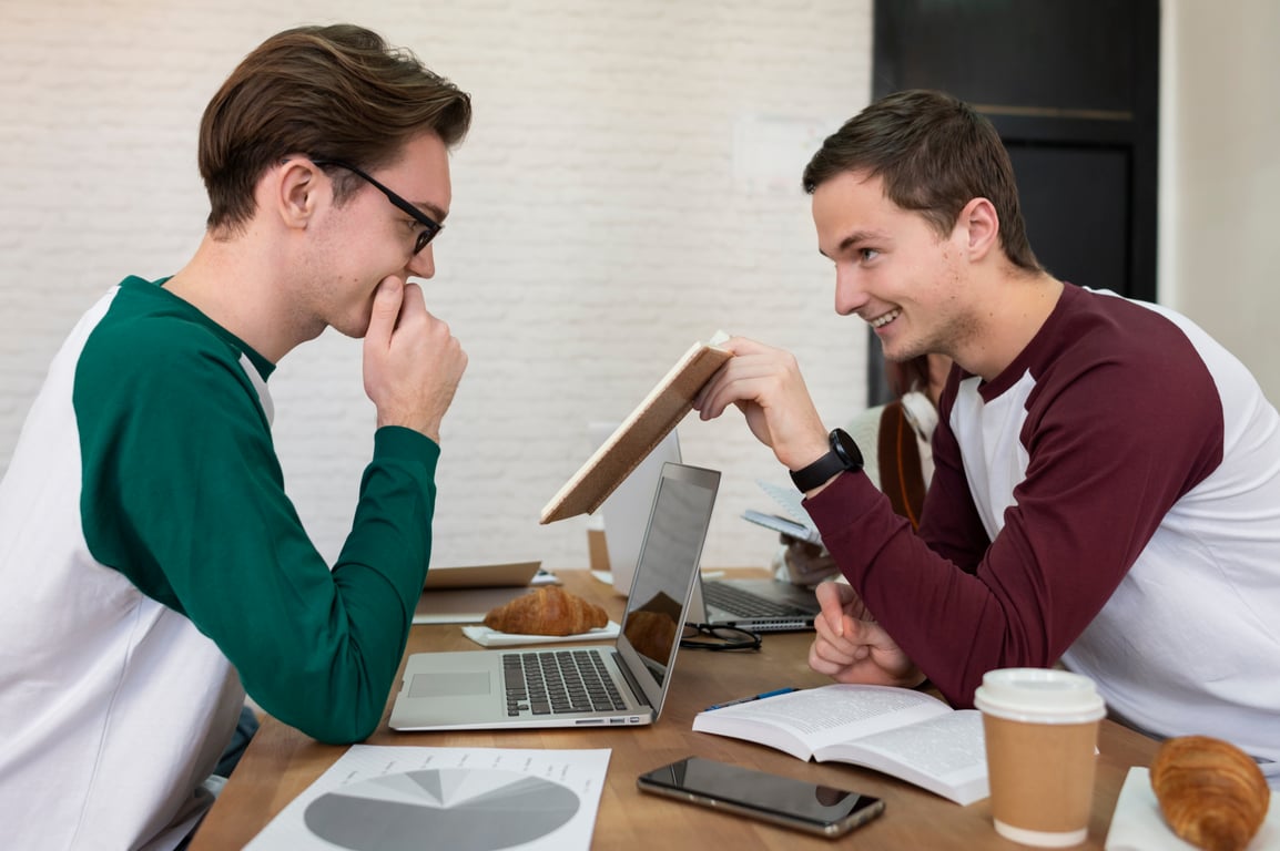 Two supporters comparing fundraising approaches