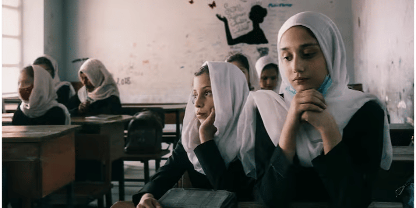 Schoolgirls listening in class