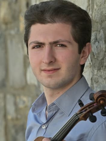 Music conservatory student with his cello