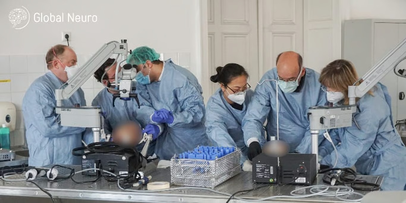 Surgeons in a hands-on neurosurgery training lab