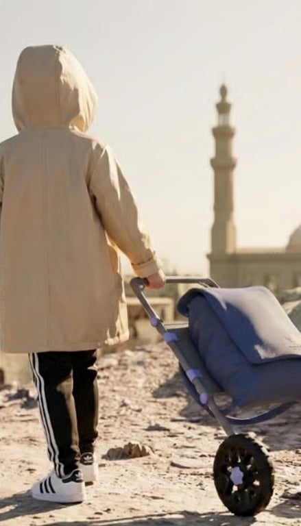 Child pulling The School Bag Project trolley