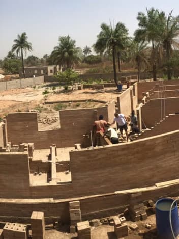 Volunteers building a new school