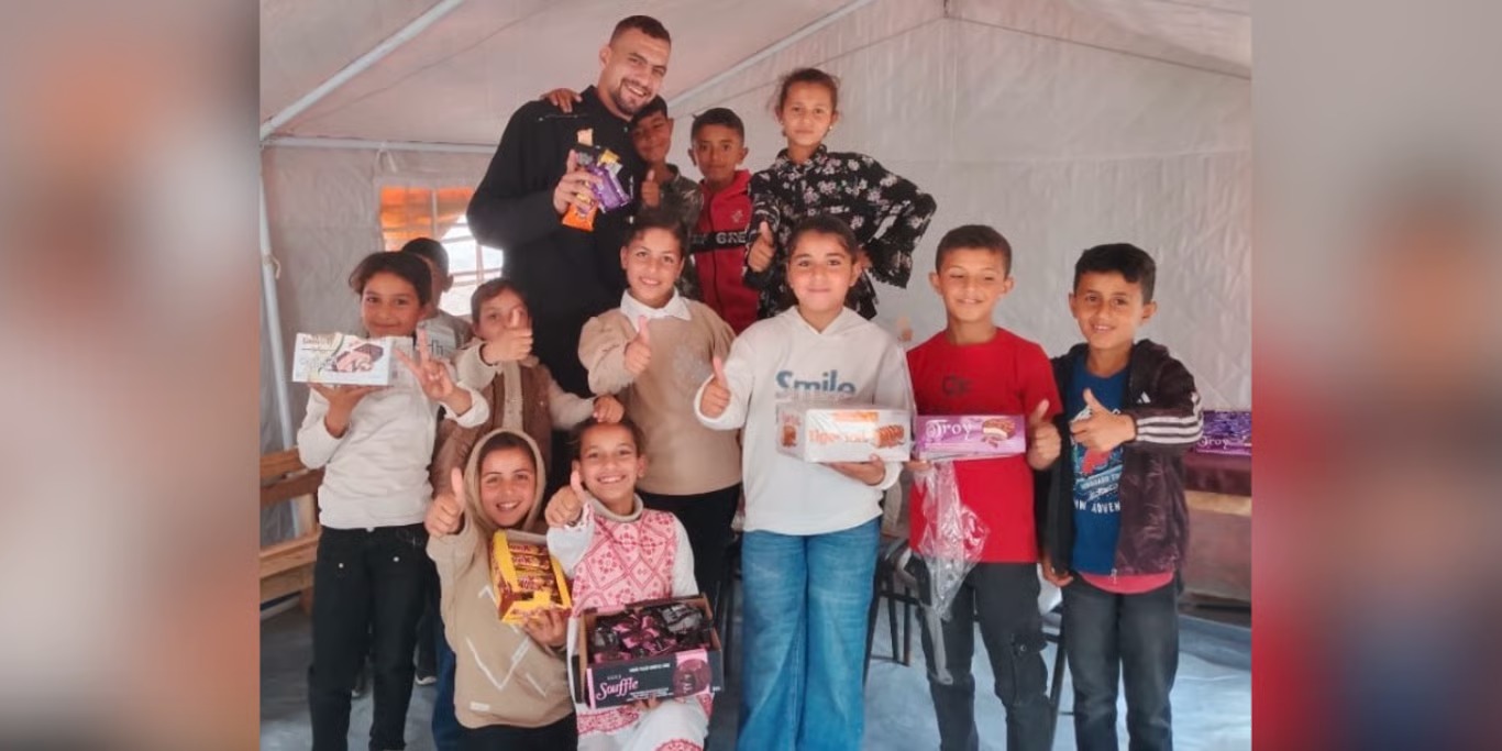 Children receiving treats at a relief tent