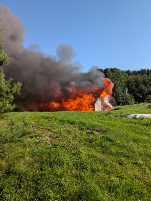 Farmhouse burning in the countryside