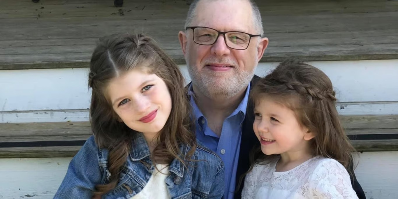 Grandfather with his two granddaughters
