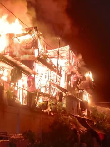Homes burning at night