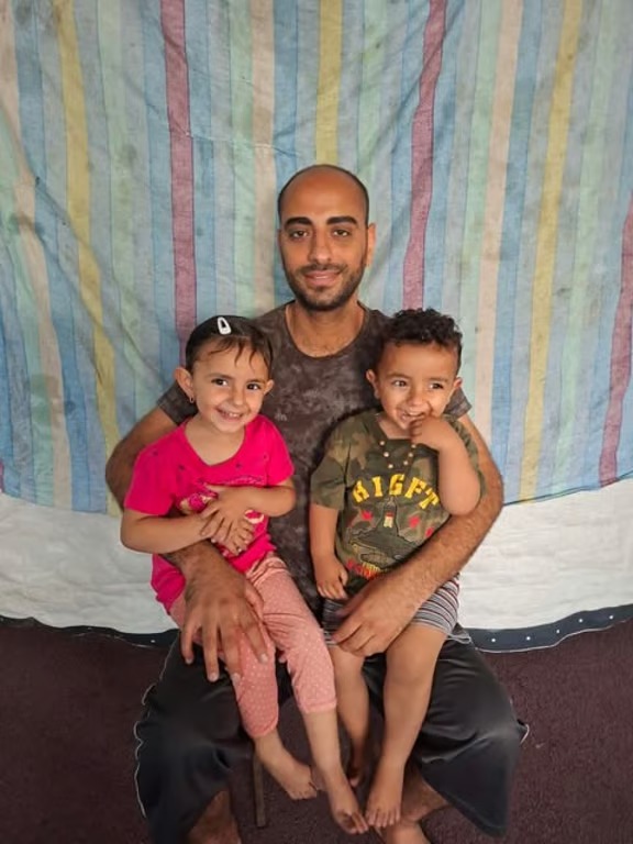 Father with his two young children