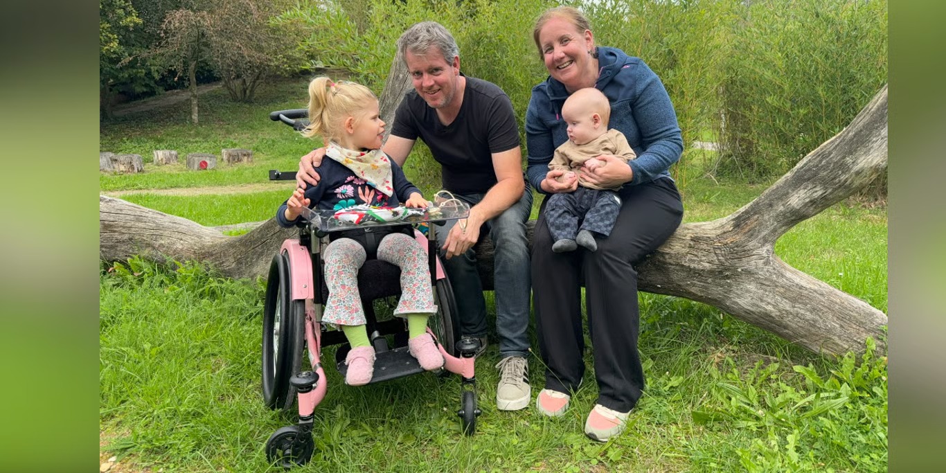 Family with their daughter in her wheelchair