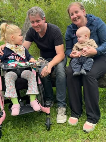 Family with their daughter in her wheelchair