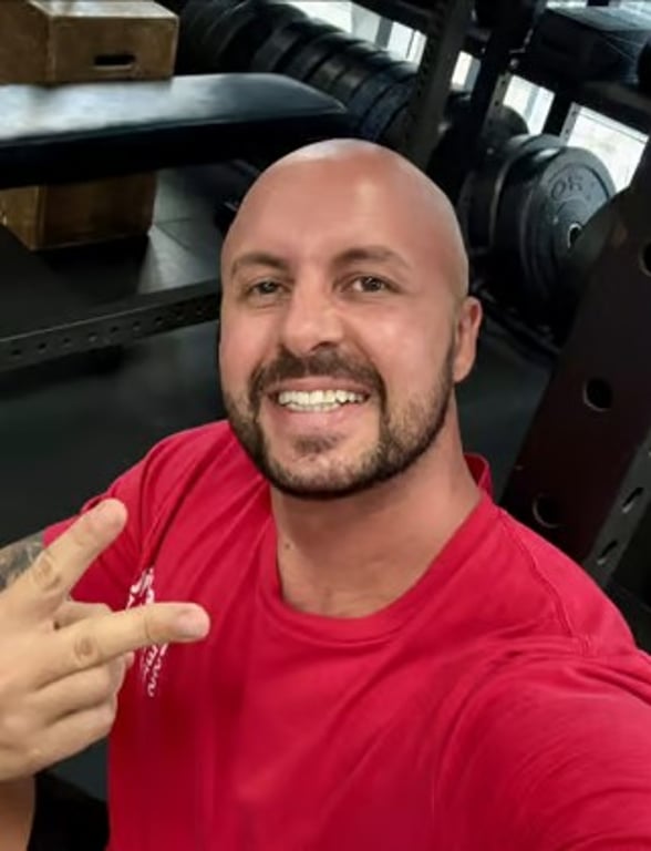 Portrait of a smiling man at the gym