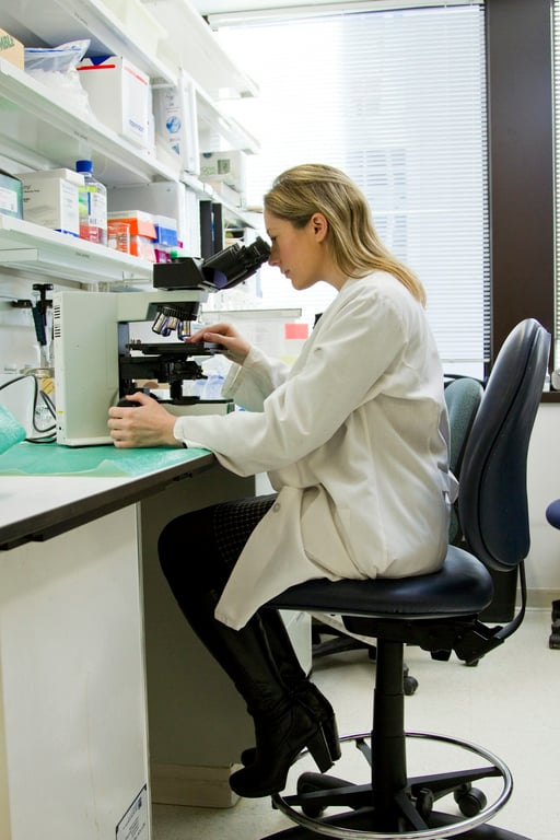 Lab technician with test tubes