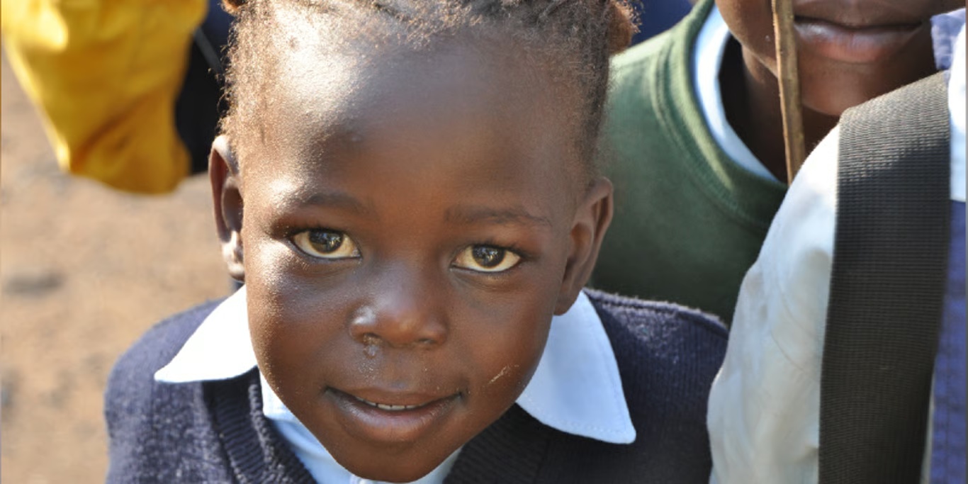 Young schoolgirl smiling