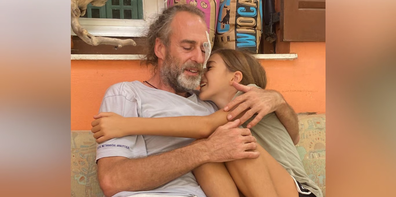 Father hugging his daughter