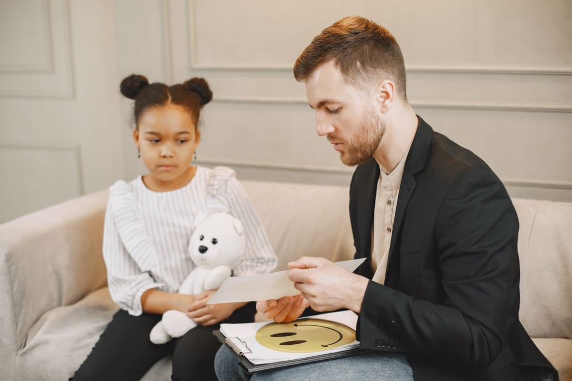 Counsellor talking with a young girl