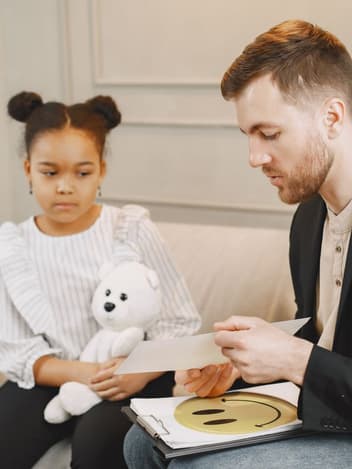 Counsellor talking with a young girl