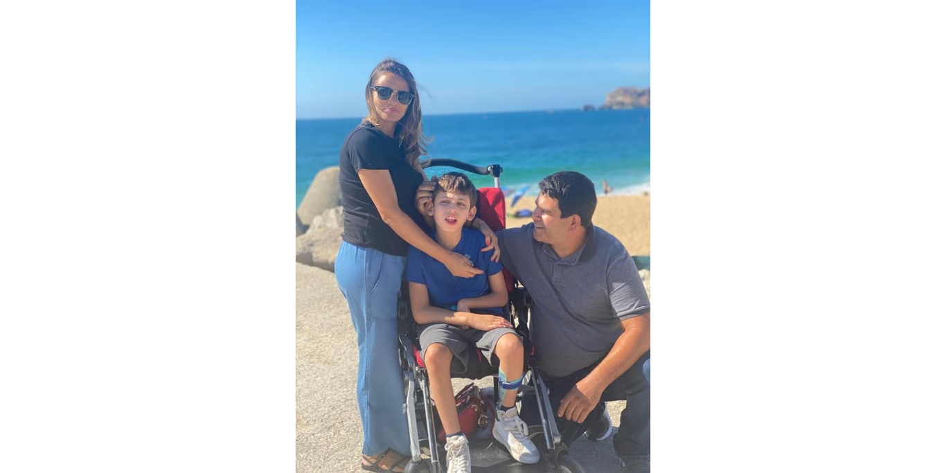 Family with their son on the beach