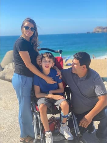 Family with their son on the beach