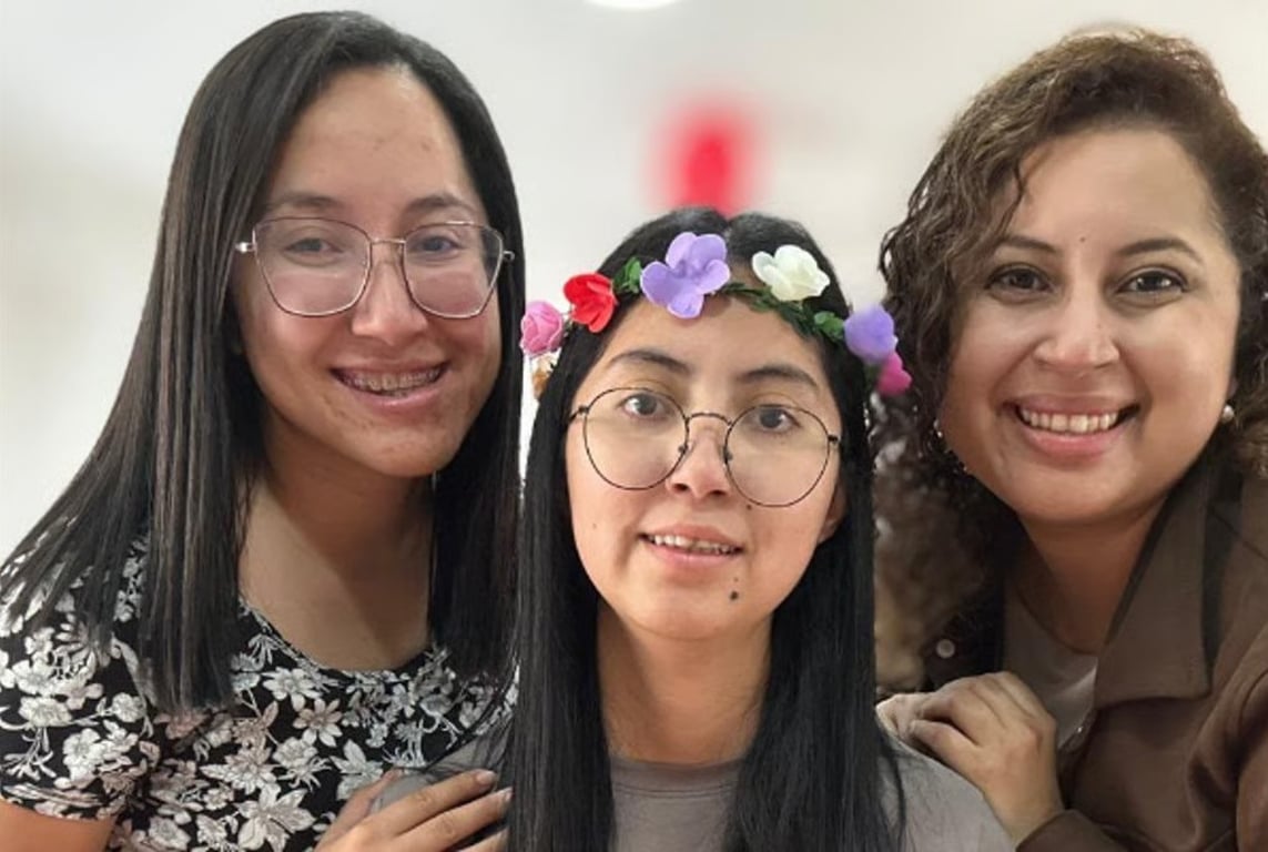 Three friends smiling together
