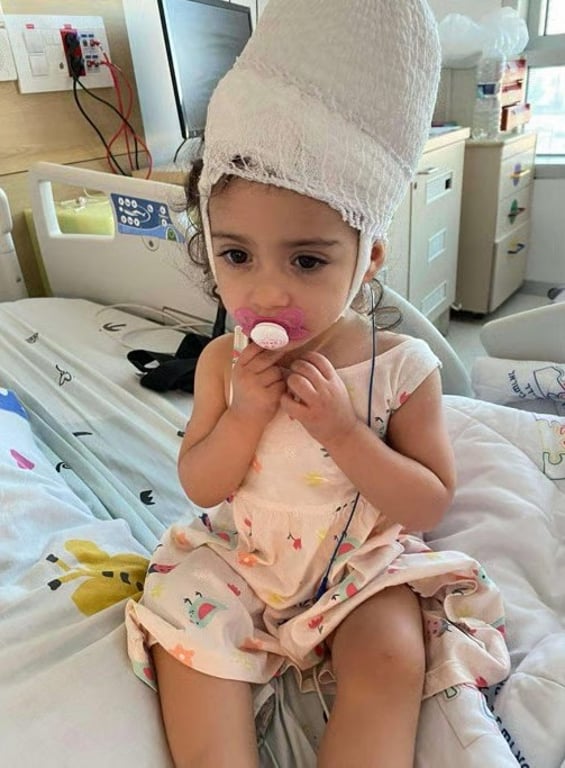 Little girl during hospital treatment