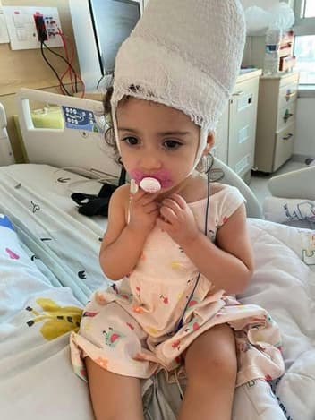 Little girl during hospital treatment