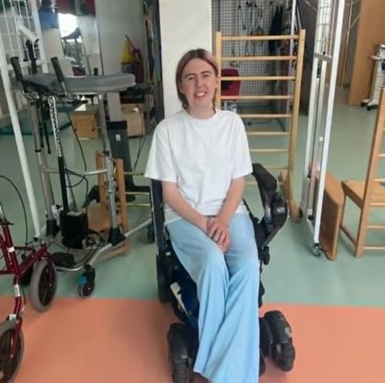 Young woman in her wheelchair at a therapy centre