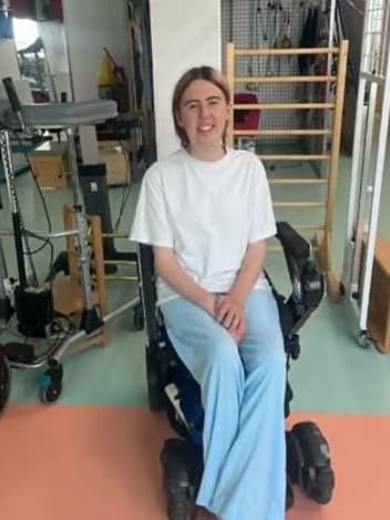 Young woman in her wheelchair at a therapy centre