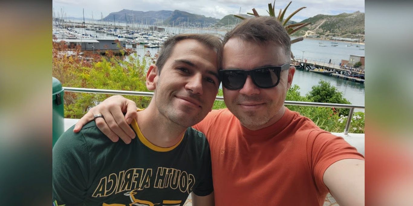 Couple smiling by the harbour