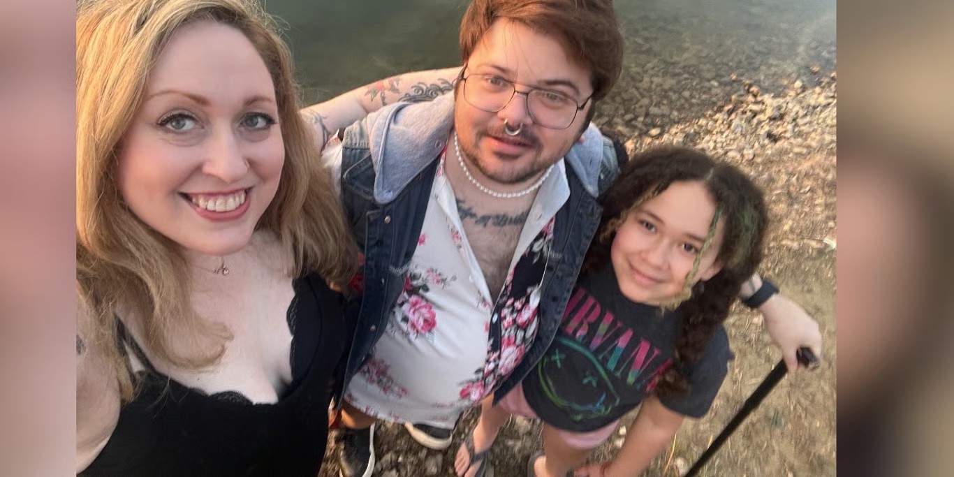Family selfie by the water