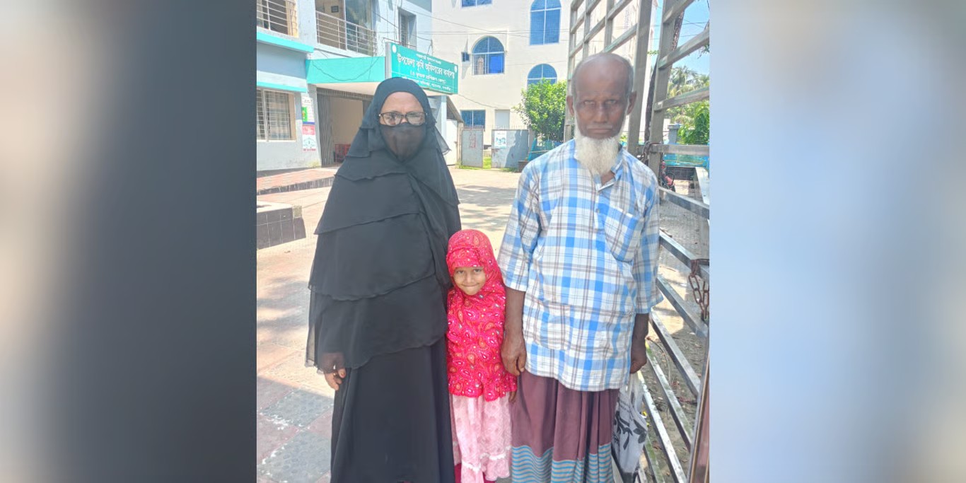 Grandparents with their granddaughter