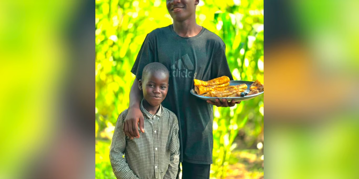 Two brothers sharing a meal