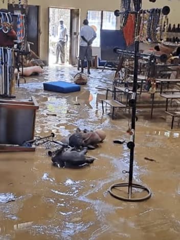 Flooded craft shop with stock scattered on the floor