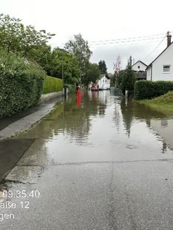 Flooded residential street in Offingen