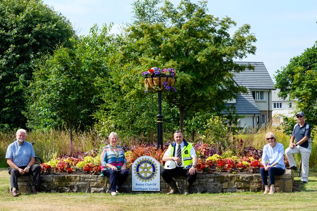 Property PR photography, Linlithgow Rotary Club and a CALA Homes representative at the Rotary Club Planter