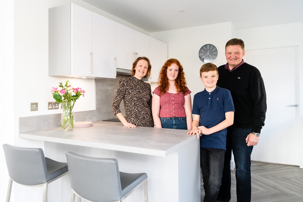 property PR photography, CALA Homes East Oakbank development Edinburgh, family of happy buyers move in four-bedroom house