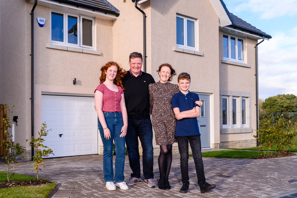 property PR photography, CALA Homes East Oakbank development Edinburgh, family of happy buyers move in four-bedroom house