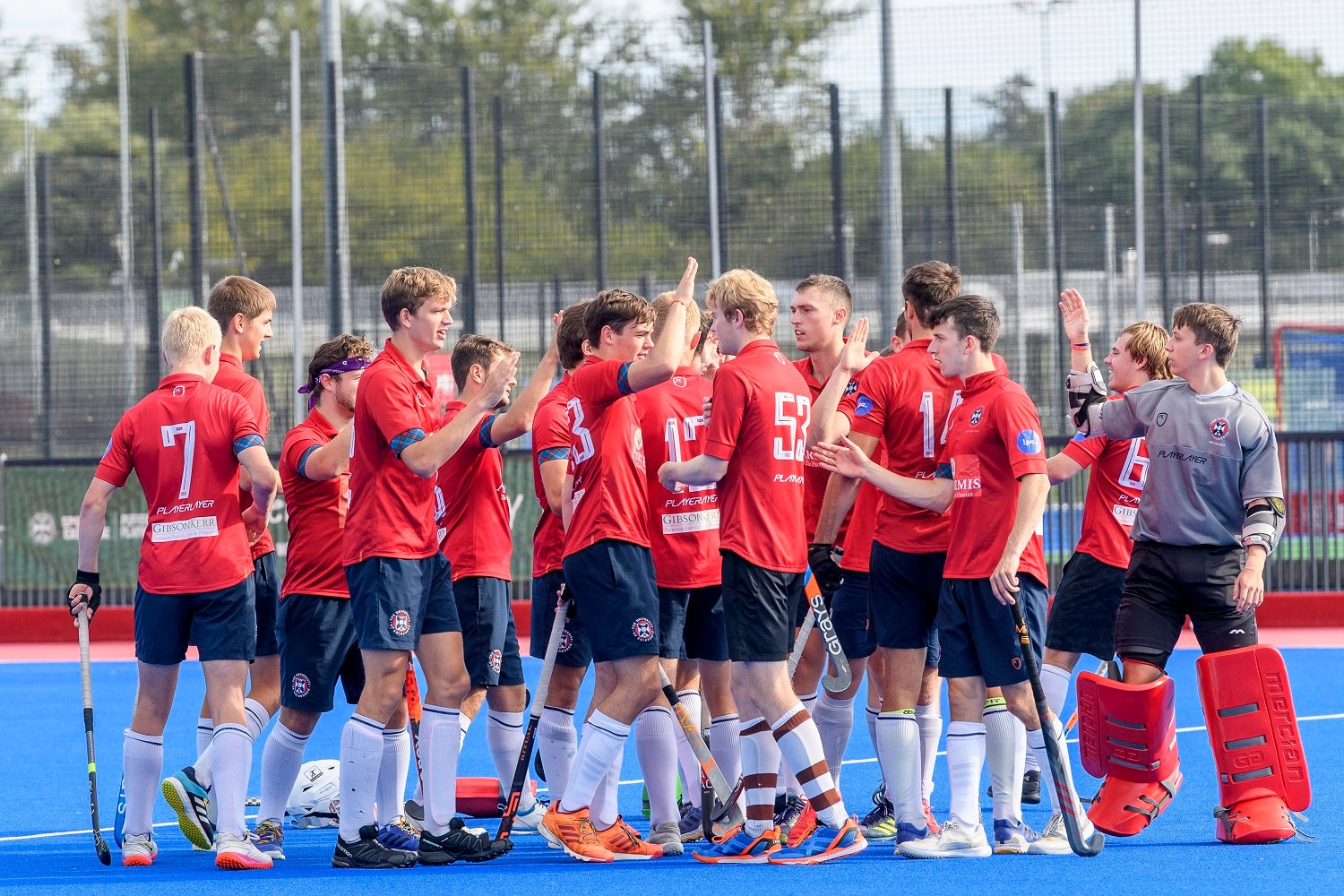 One of the clubs teams celebrates in their Gibson Kerr sponsored playing strip
