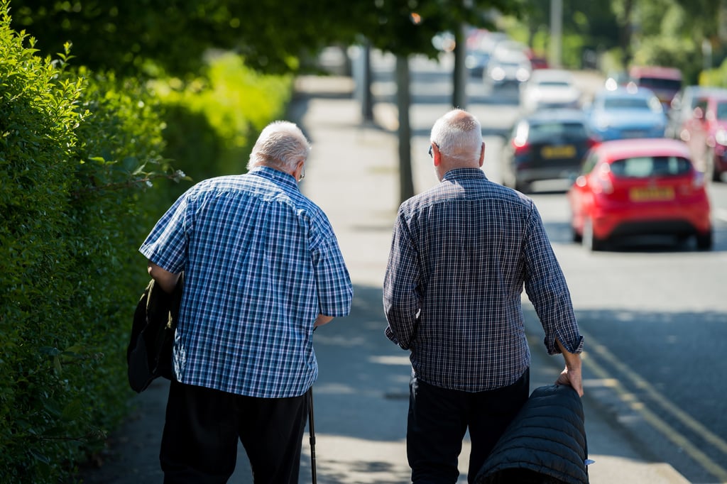 Two men walking as part of Paths for All's campaign, Health PR