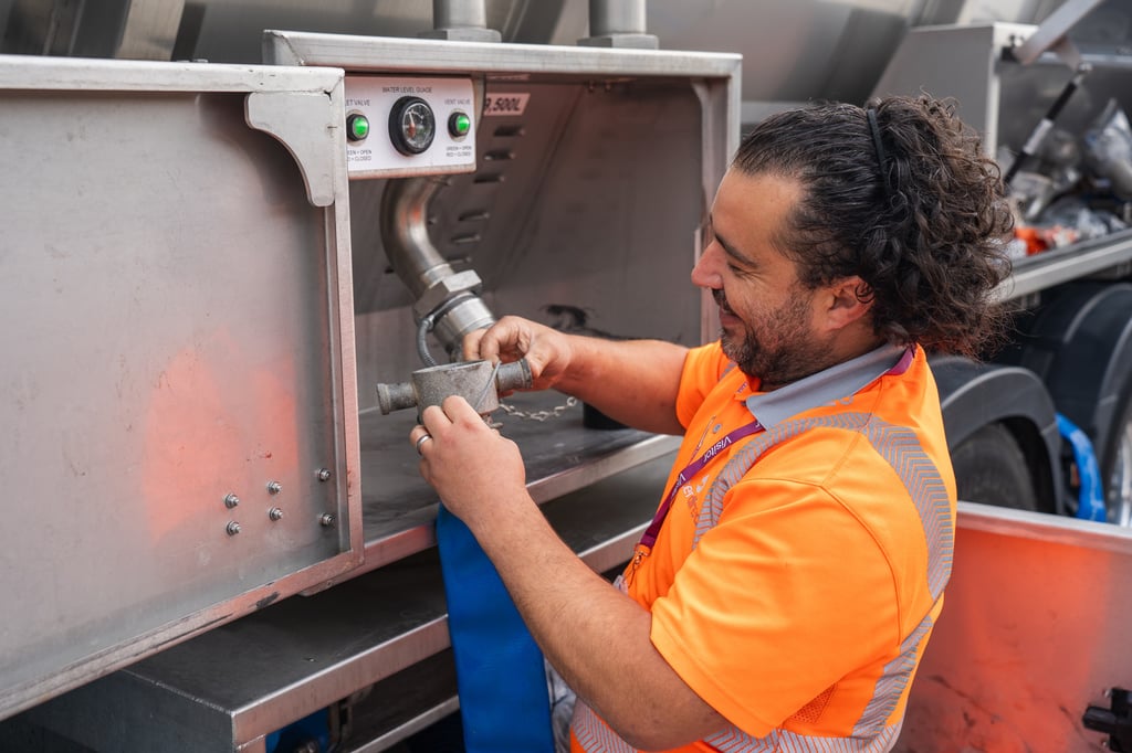 Water Direct employee working on tanker | Water services PR