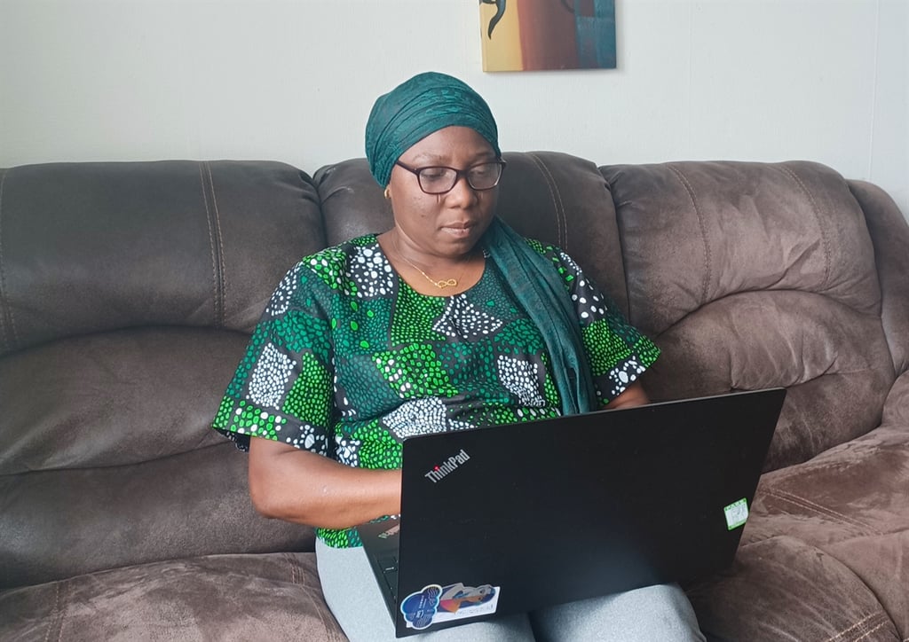 Public sector PR photography features woman using Wheatley’s Techshare programme,