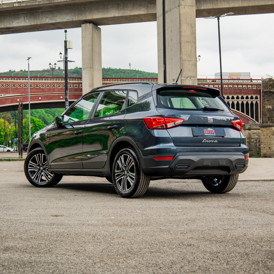 Rear view of the SEAT Arona FR highlighting the distinctive design elements available with AMT Auto car leasing.