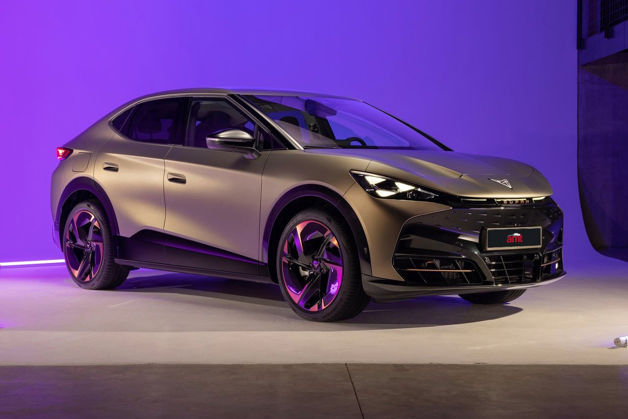 A stylish exterior view of the Cupra Tavascan, showcasing its modern design and sleek matte finish under vibrant purple lighting.