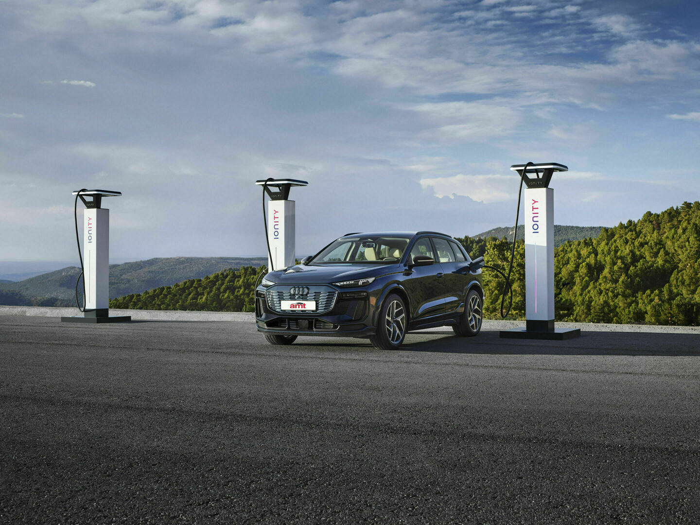 Audi Q6 charging at an Ionity station, showcasing its fast charging capabilities. Available for electric vehicle leasing at AMT Auto.