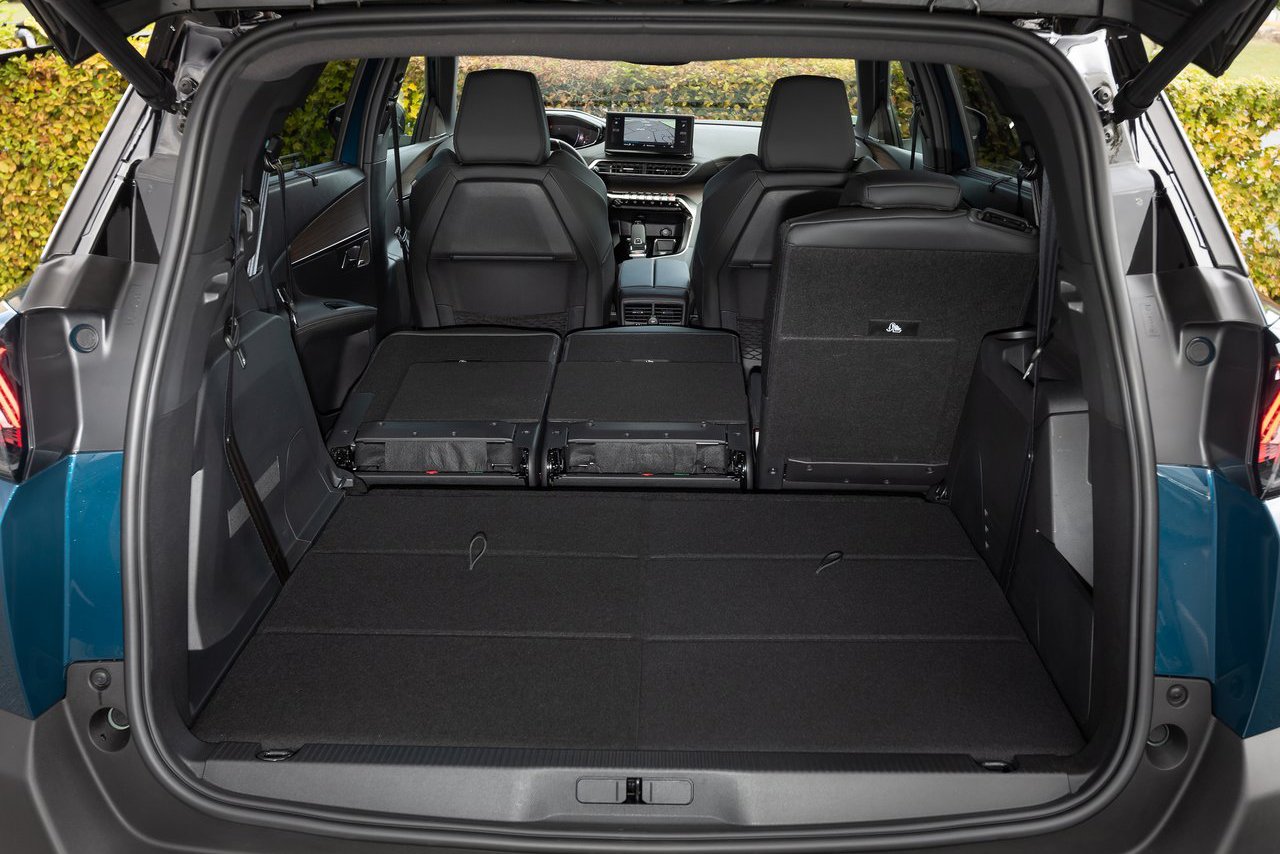 Generous boot space in the Peugeot 5008 with the rear seats folded down, ideal for family trips or transporting larger items.
