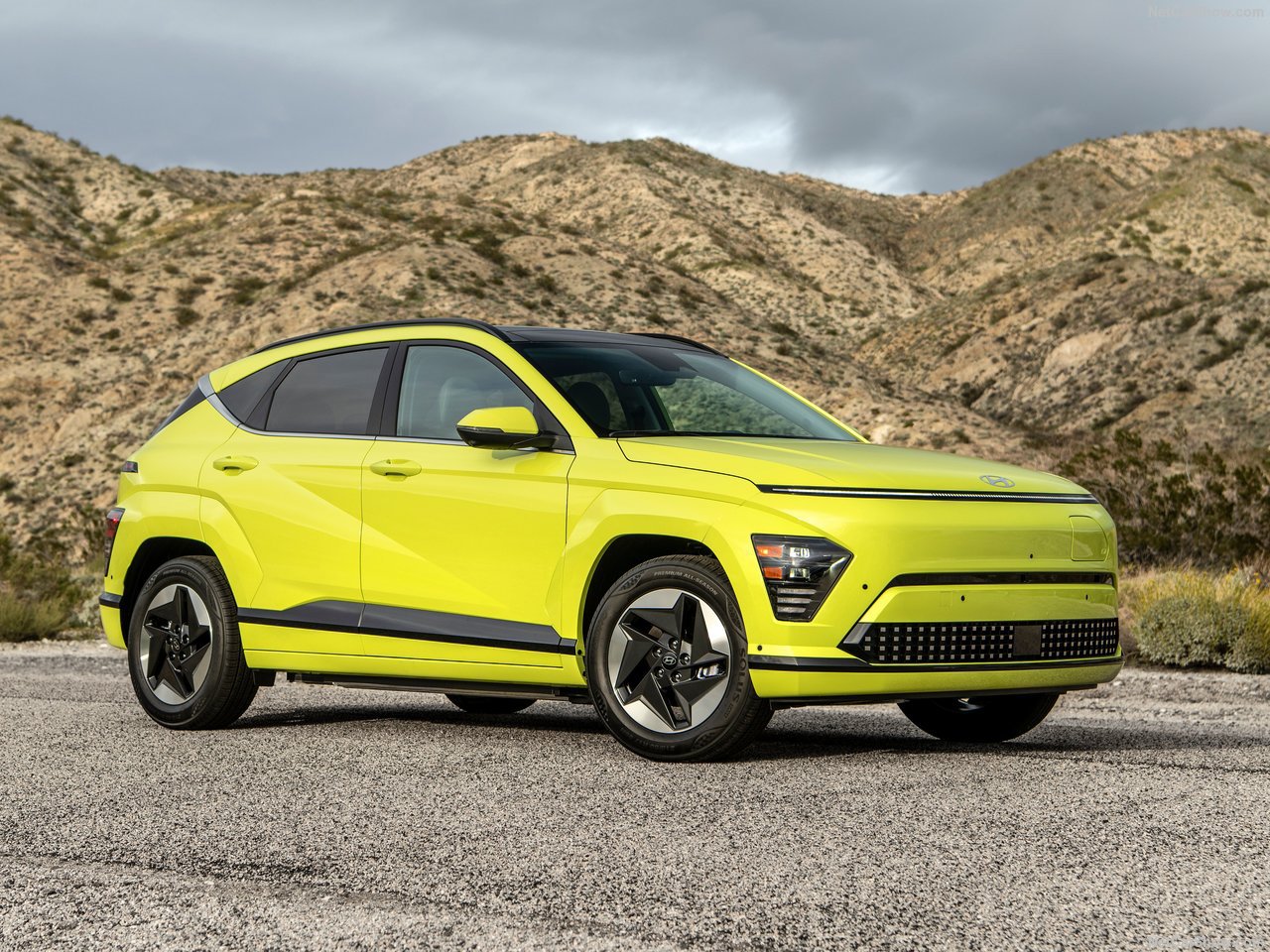 Hyundai Kona Electric parked, showcasing sleek design and compact SUV size.