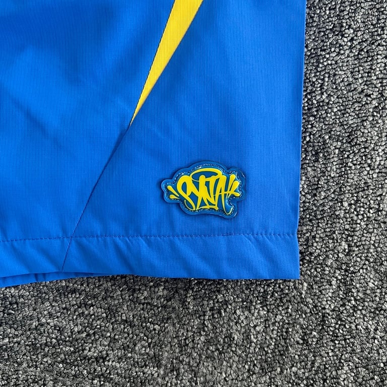 Syna World Vortex Track Shorts Blue/Yellow - 10