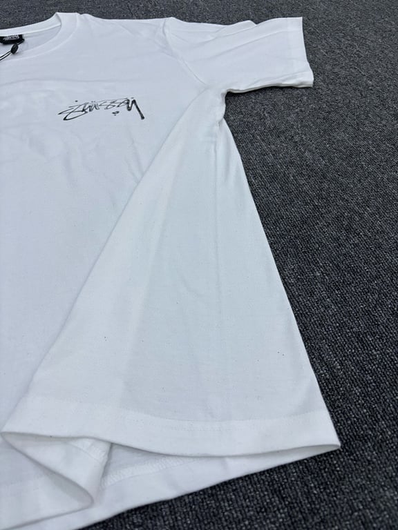 Stüssy Liquid Logo Graphic Tee - 7